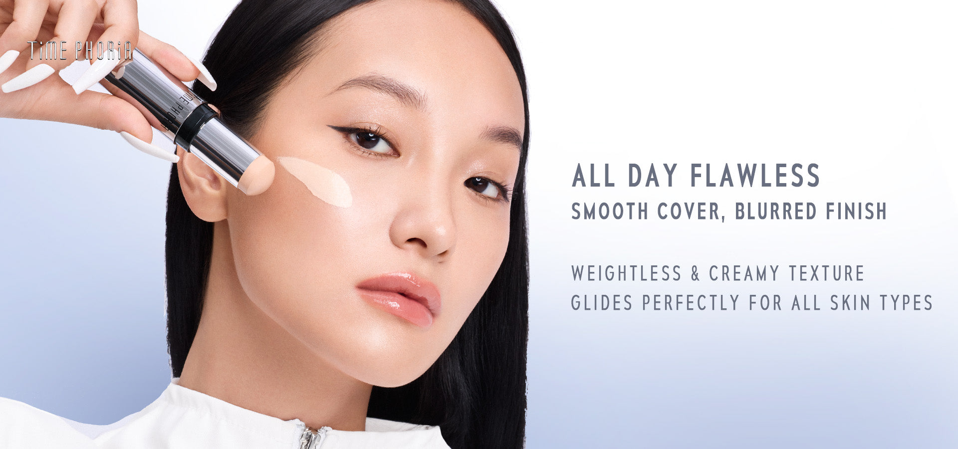 Time Phoria skin tint stick Woman applying makeup with a focus on smooth cover and blurred finish, set against a light blue background.